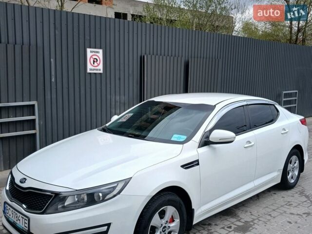 Белый Киа K5, объемом двигателя 2 л и пробегом 265 тыс. км за 9500 $, фото 1 на Automoto.ua