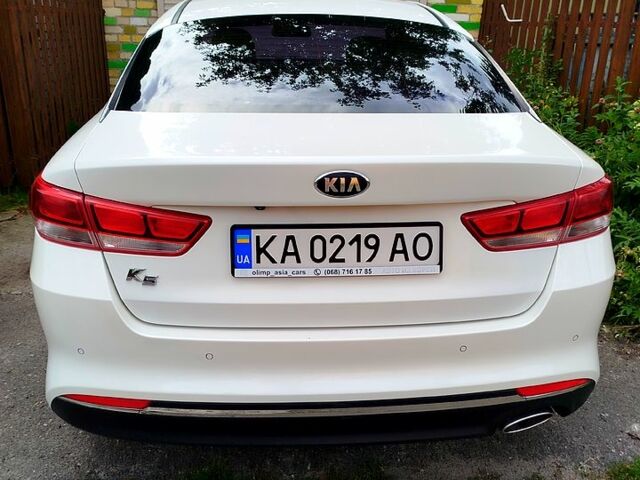 Білий Кіа K5, об'ємом двигуна 2 л та пробігом 143 тис. км за 10500 $, фото 1 на Automoto.ua