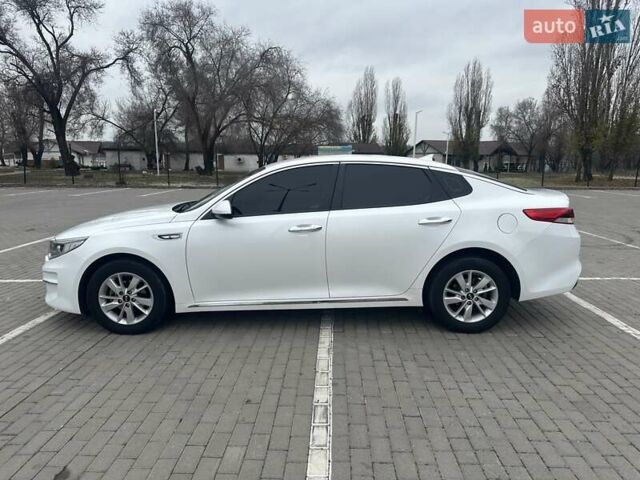 Білий Кіа K5, об'ємом двигуна 2 л та пробігом 259 тис. км за 12500 $, фото 1 на Automoto.ua