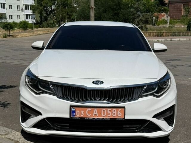 Білий Кіа K5, об'ємом двигуна 2 л та пробігом 168 тис. км за 14700 $, фото 1 на Automoto.ua