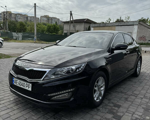 Черный Киа K5, объемом двигателя 2 л и пробегом 225 тыс. км за 9900 $, фото 1 на Automoto.ua
