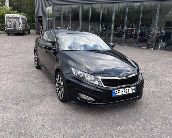 Черный Киа K5, объемом двигателя 2 л и пробегом 220 тыс. км за 7999 $, фото 1 на Automoto.ua