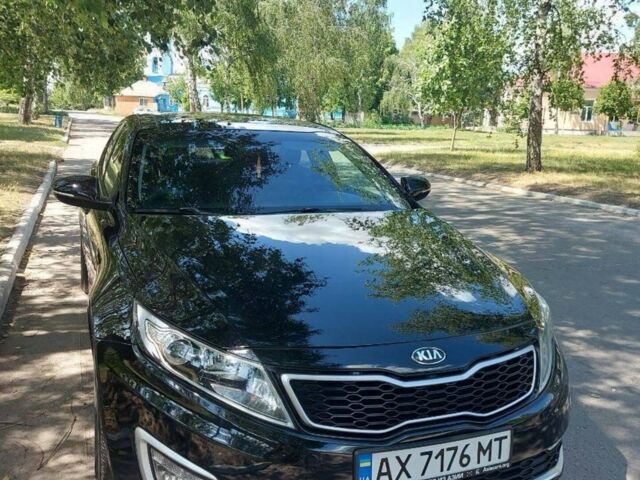 Черный Киа K5, объемом двигателя 2 л и пробегом 185 тыс. км за 10100 $, фото 1 на Automoto.ua