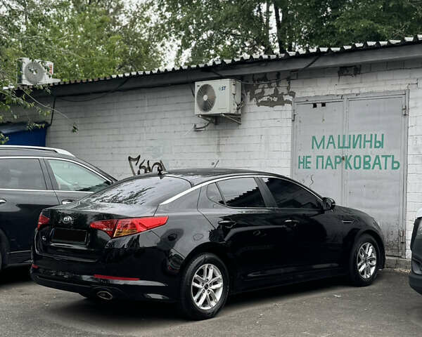 Черный Киа K5, объемом двигателя 2 л и пробегом 445 тыс. км за 6500 $, фото 1 на Automoto.ua