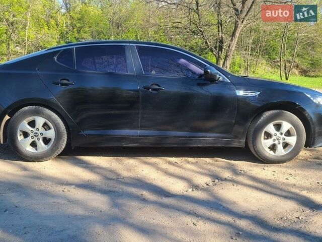 Черный Киа K5, объемом двигателя 2 л и пробегом 272 тыс. км за 7500 $, фото 1 на Automoto.ua