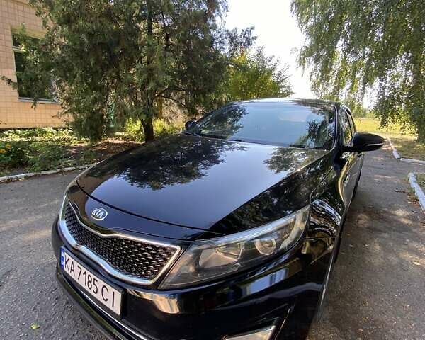 Чорний Кіа K5, об'ємом двигуна 2 л та пробігом 209 тис. км за 8200 $, фото 1 на Automoto.ua