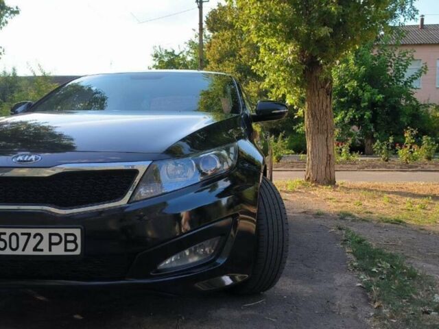 Черный Киа K5, объемом двигателя 2 л и пробегом 195 тыс. км за 7000 $, фото 1 на Automoto.ua