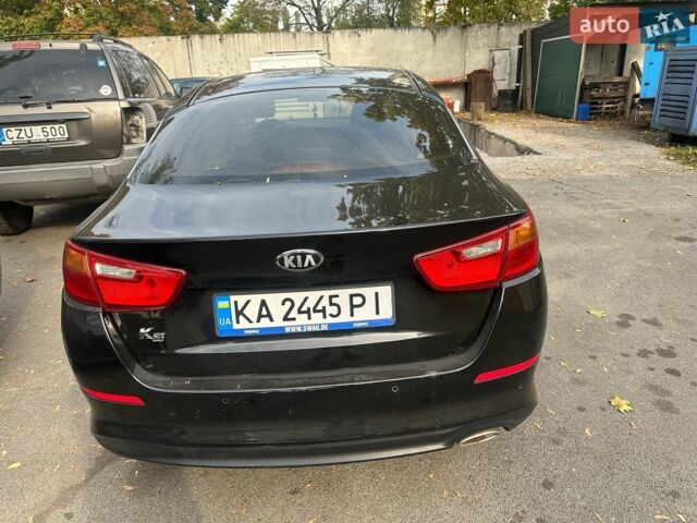 Черный Киа K5, объемом двигателя 2 л и пробегом 326 тыс. км за 6000 $, фото 1 на Automoto.ua
