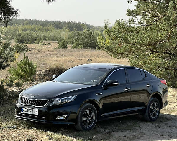 Черный Киа K5, объемом двигателя 2 л и пробегом 202 тыс. км за 9900 $, фото 1 на Automoto.ua