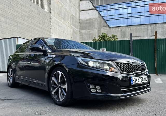 Черный Киа K5, объемом двигателя 2 л и пробегом 209 тыс. км за 9499 $, фото 1 на Automoto.ua