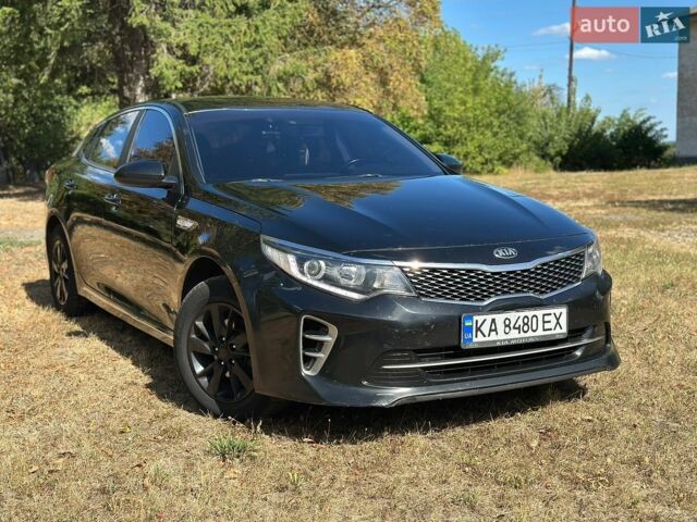 Черный Киа K5, объемом двигателя 2 л и пробегом 267 тыс. км за 10300 $, фото 1 на Automoto.ua