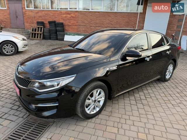 Черный Киа K5, объемом двигателя 2 л и пробегом 224 тыс. км за 12000 $, фото 1 на Automoto.ua