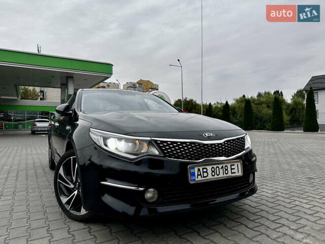 Черный Киа K5, объемом двигателя 2 л и пробегом 221 тыс. км за 11599 $, фото 1 на Automoto.ua