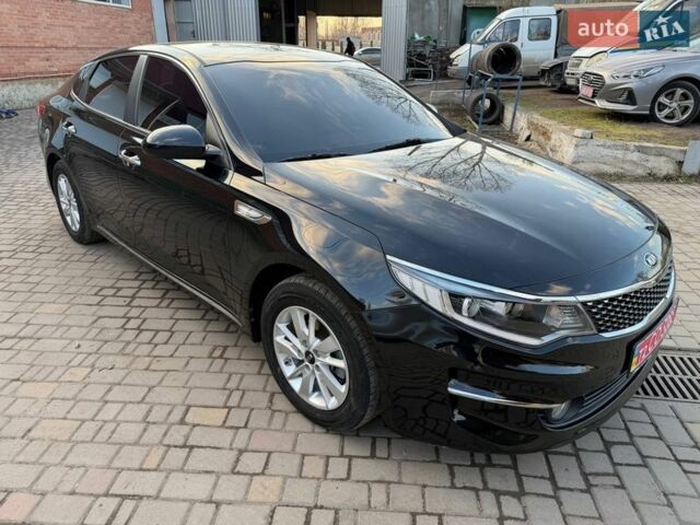 Черный Киа K5, объемом двигателя 2 л и пробегом 214 тыс. км за 11999 $, фото 1 на Automoto.ua