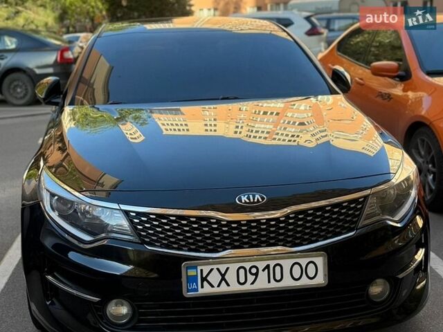 Черный Киа K5, объемом двигателя 2 л и пробегом 230 тыс. км за 12790 $, фото 1 на Automoto.ua