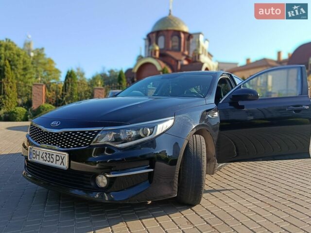 Черный Киа K5, объемом двигателя 2 л и пробегом 203 тыс. км за 13500 $, фото 1 на Automoto.ua