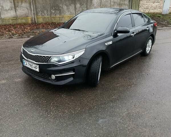Чорний Кіа K5, об'ємом двигуна 2 л та пробігом 276 тис. км за 13200 $, фото 1 на Automoto.ua