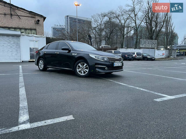 Черный Киа K5, объемом двигателя 2 л и пробегом 230 тыс. км за 13499 $, фото 1 на Automoto.ua