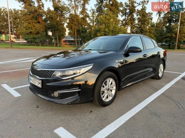 Черный Киа K5, объемом двигателя 2 л и пробегом 270 тыс. км за 11500 $, фото 1 на Automoto.ua