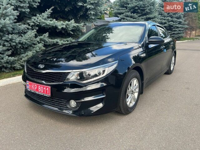 Черный Киа K5, объемом двигателя 2 л и пробегом 328 тыс. км за 11990 $, фото 1 на Automoto.ua