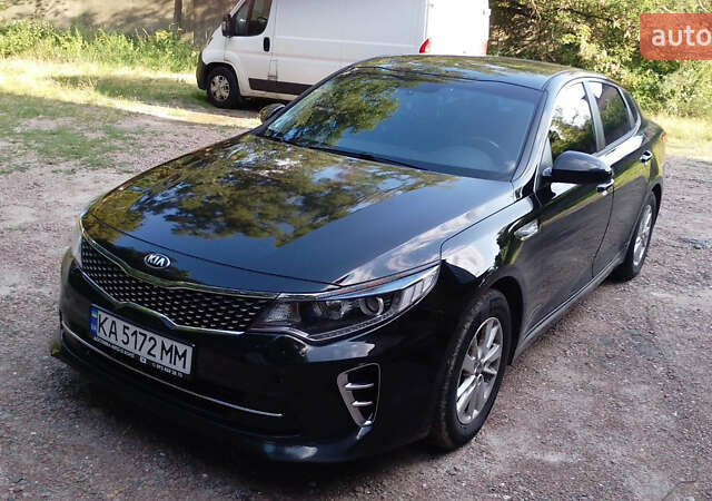 Чорний Кіа K5, об'ємом двигуна 2 л та пробігом 258 тис. км за 13500 $, фото 1 на Automoto.ua