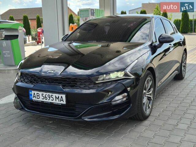 Черный Киа K5, объемом двигателя 2 л и пробегом 171 тыс. км за 19500 $, фото 1 на Automoto.ua