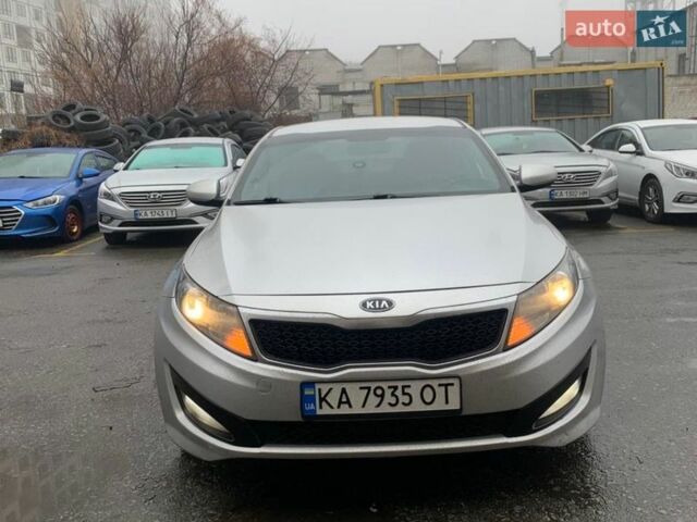 Серый Киа K5, объемом двигателя 2 л и пробегом 450 тыс. км за 5500 $, фото 1 на Automoto.ua