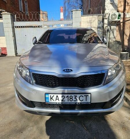 Серый Киа K5, объемом двигателя 2 л и пробегом 234 тыс. км за 9500 $, фото 1 на Automoto.ua