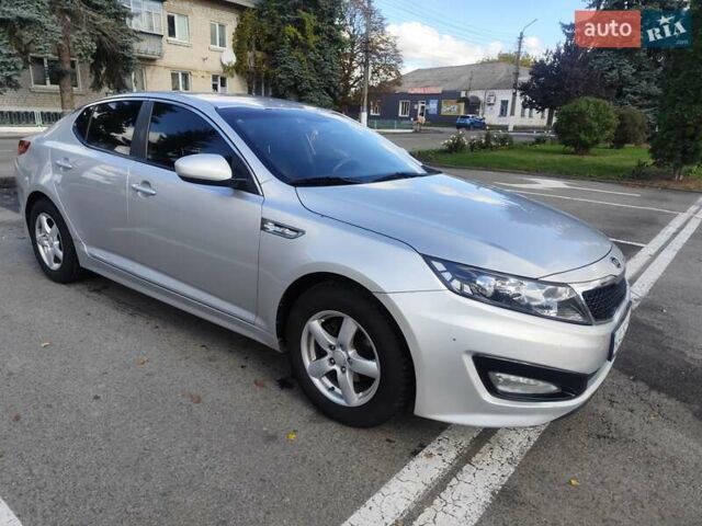 Серый Киа K5, объемом двигателя 2 л и пробегом 164 тыс. км за 7500 $, фото 1 на Automoto.ua