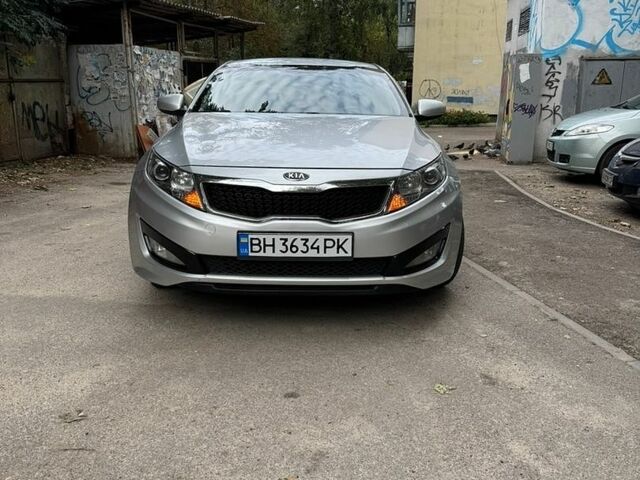 Серый Киа K5, объемом двигателя 2 л и пробегом 235 тыс. км за 8500 $, фото 1 на Automoto.ua