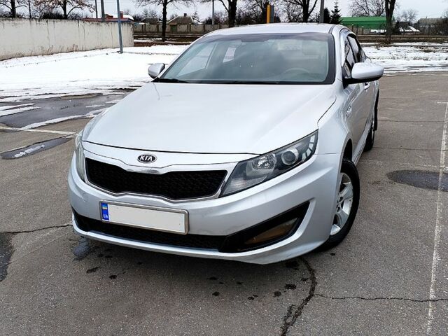 Серый Киа K5, объемом двигателя 20 л и пробегом 350 тыс. км за 6800 $, фото 1 на Automoto.ua