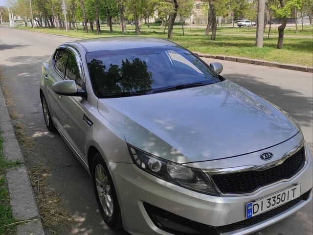Серый Киа K5, объемом двигателя 2 л и пробегом 333 тыс. км за 8700 $, фото 1 на Automoto.ua