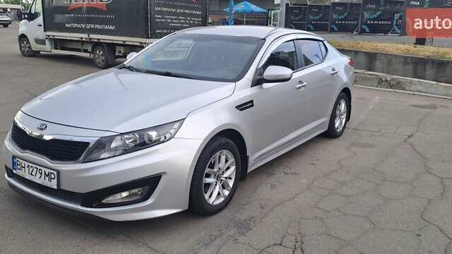 Серый Киа K5, объемом двигателя 2 л и пробегом 316 тыс. км за 7700 $, фото 1 на Automoto.ua