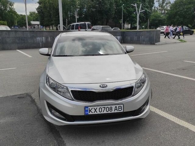 Серый Киа K5, объемом двигателя 2 л и пробегом 574 тыс. км за 6900 $, фото 1 на Automoto.ua