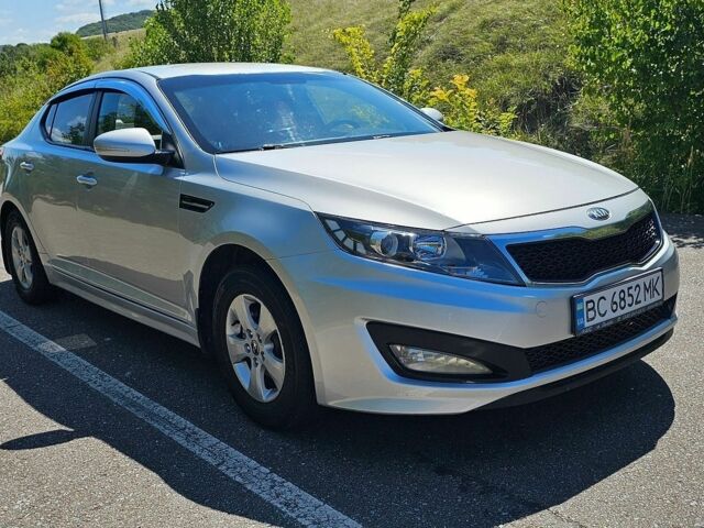 Серый Киа K5, объемом двигателя 2 л и пробегом 263 тыс. км за 7500 $, фото 1 на Automoto.ua