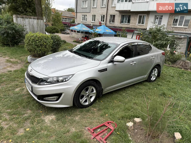 Серый Киа K5, объемом двигателя 2 л и пробегом 260 тыс. км за 7800 $, фото 1 на Automoto.ua