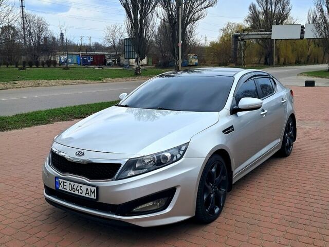 Серый Киа K5, объемом двигателя 2 л и пробегом 174 тыс. км за 8000 $, фото 1 на Automoto.ua