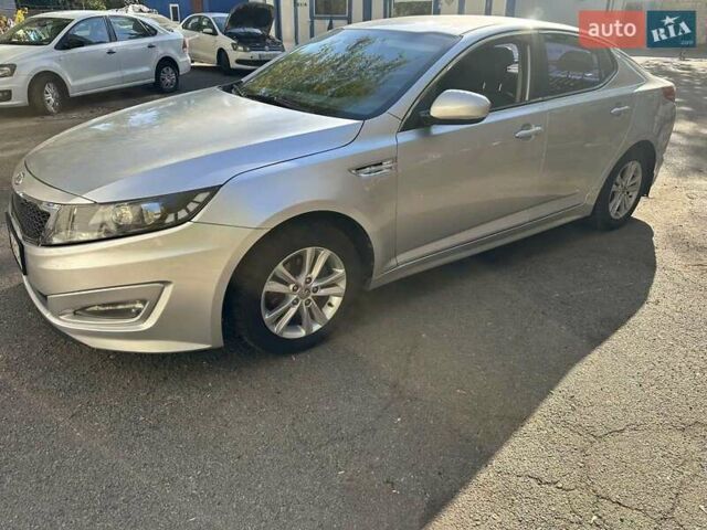 Серый Киа K5, объемом двигателя 2 л и пробегом 280 тыс. км за 6800 $, фото 1 на Automoto.ua