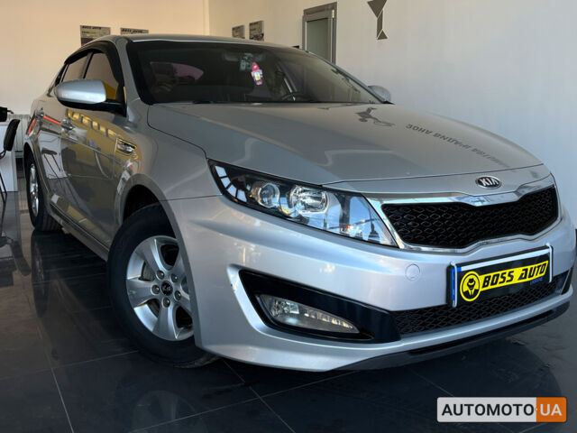 Серый Киа K5, объемом двигателя 2 л и пробегом 166 тыс. км за 9700 $, фото 1 на Automoto.ua