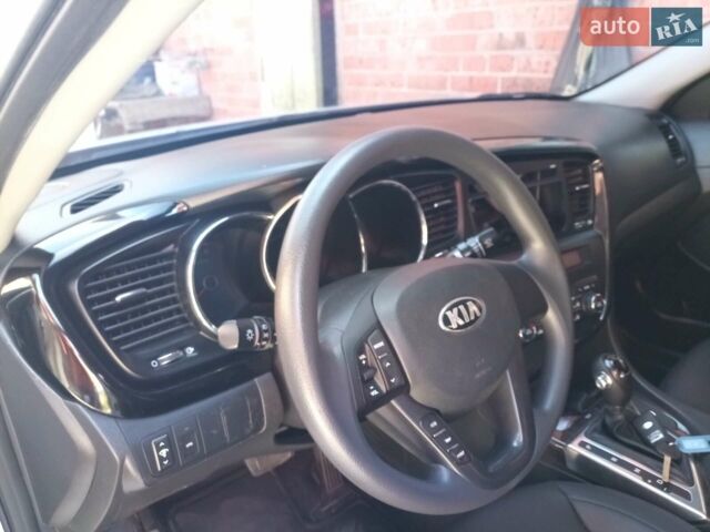 Сірий Кіа K5, об'ємом двигуна 2 л та пробігом 220 тис. км за 9500 $, фото 1 на Automoto.ua