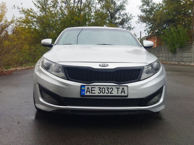 Серый Киа K5, объемом двигателя 2 л и пробегом 190 тыс. км за 9500 $, фото 1 на Automoto.ua