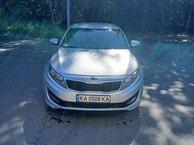 Серый Киа K5, объемом двигателя 2 л и пробегом 382 тыс. км за 9000 $, фото 1 на Automoto.ua