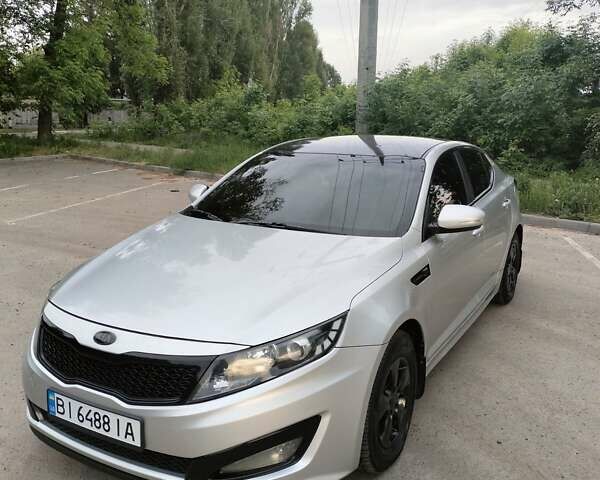 Сірий Кіа K5, об'ємом двигуна 2 л та пробігом 325 тис. км за 9300 $, фото 1 на Automoto.ua