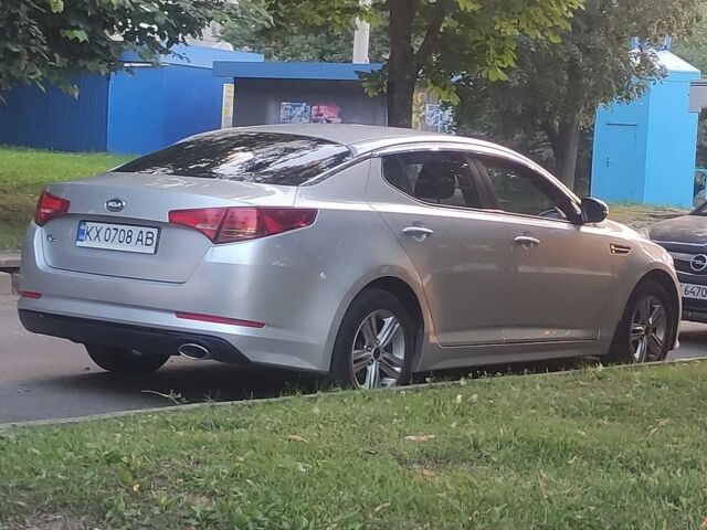 Серый Киа K5, объемом двигателя 2 л и пробегом 574 тыс. км за 6300 $, фото 1 на Automoto.ua