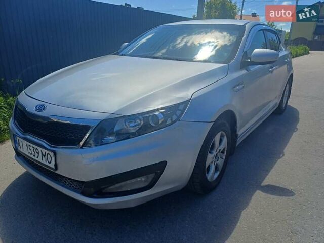 Серый Киа K5, объемом двигателя 2 л и пробегом 129 тыс. км за 5450 $, фото 1 на Automoto.ua