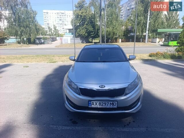 Серый Киа K5, объемом двигателя 2 л и пробегом 584 тыс. км за 8000 $, фото 1 на Automoto.ua