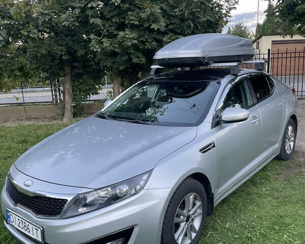 Серый Киа K5, объемом двигателя 2 л и пробегом 285 тыс. км за 8000 $, фото 1 на Automoto.ua