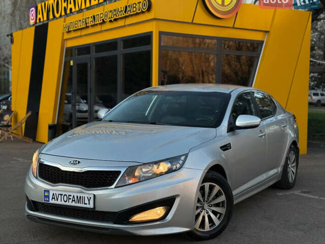 Серый Киа K5, объемом двигателя 2 л и пробегом 400 тыс. км за 8499 $, фото 1 на Automoto.ua