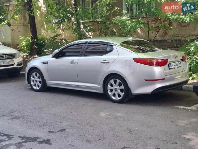 Серый Киа K5, объемом двигателя 2 л и пробегом 190 тыс. км за 8500 $, фото 1 на Automoto.ua