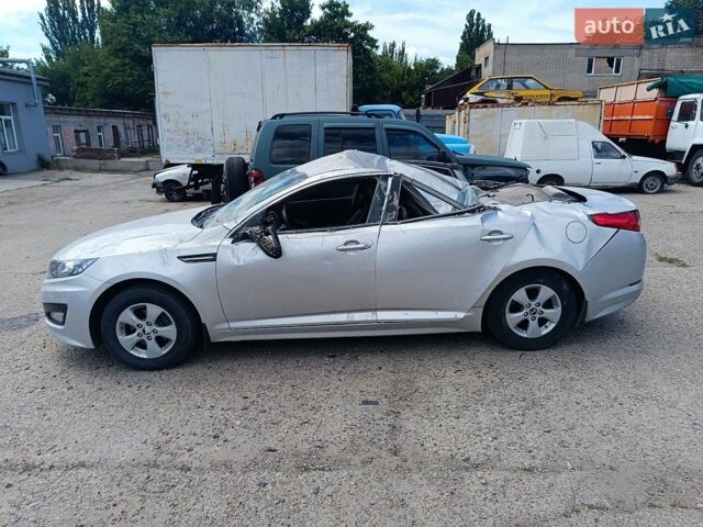 Серый Киа K5, объемом двигателя 2 л и пробегом 350 тыс. км за 3000 $, фото 1 на Automoto.ua